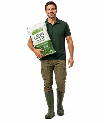 Man carrying bag of lawn seed