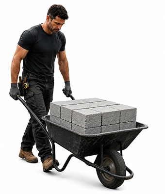 Man pushing a wheel barrow