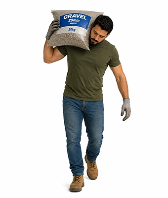 Man carrying bag of gravel