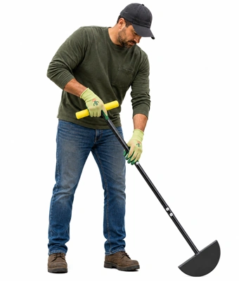 Man carrying a half moon lawn edger