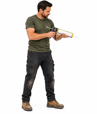 Man holding a caulking gun