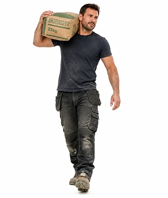 Man carrying a bag of cement