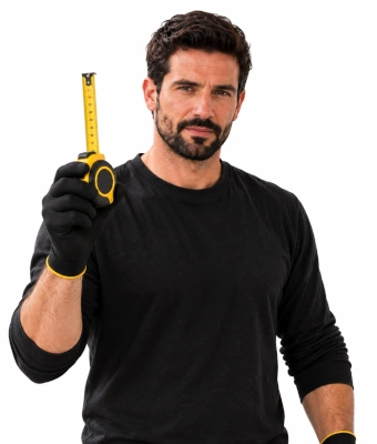 Man holding a measuring tape to assist in replacing and mitre your door architraves