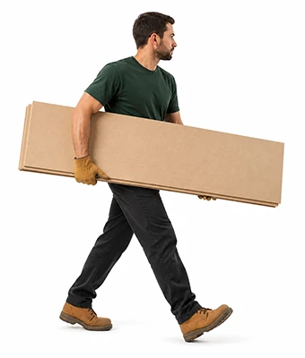 Man carrying mdf sheets