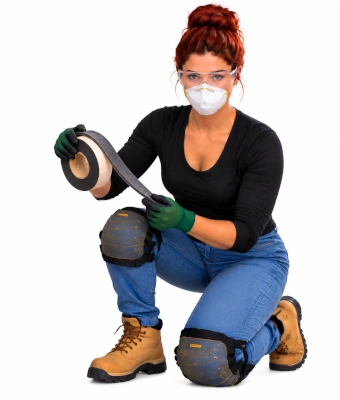 Lady holding a roll of adhesive tape to top up attic insulation layers
