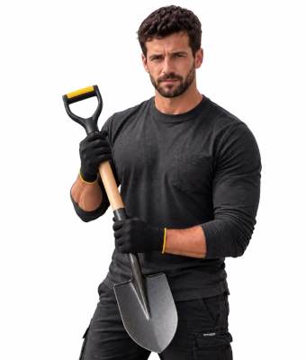 Man holding a shovel to set up a traditional outdoor clothesline post